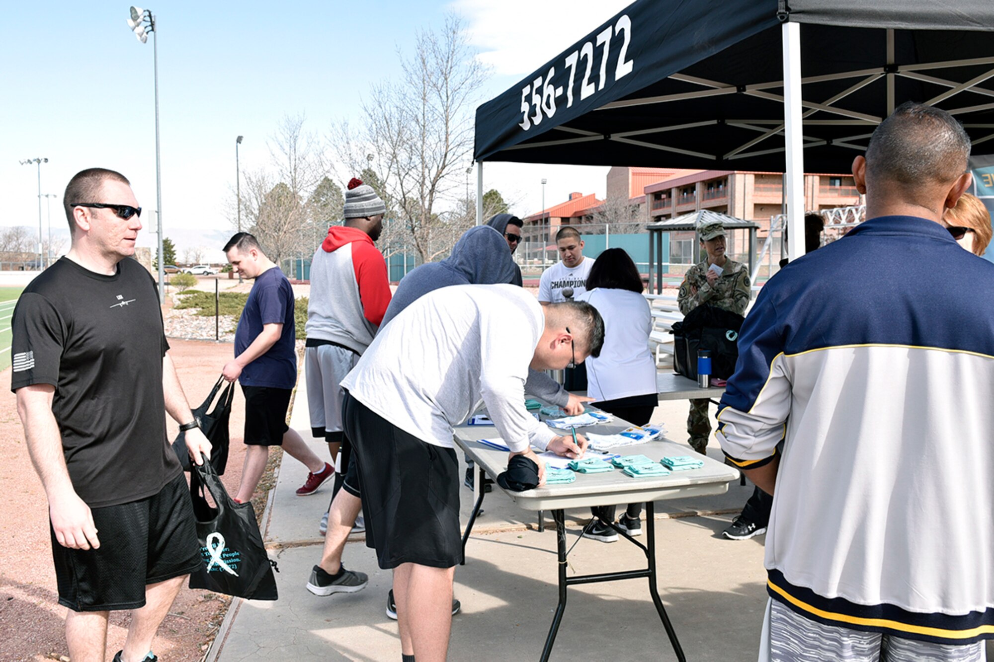 21st Space Wing Sexual Assault Prevention and Response team run a Walk-a-Lap event in support of sexual assault awareness and prevention month