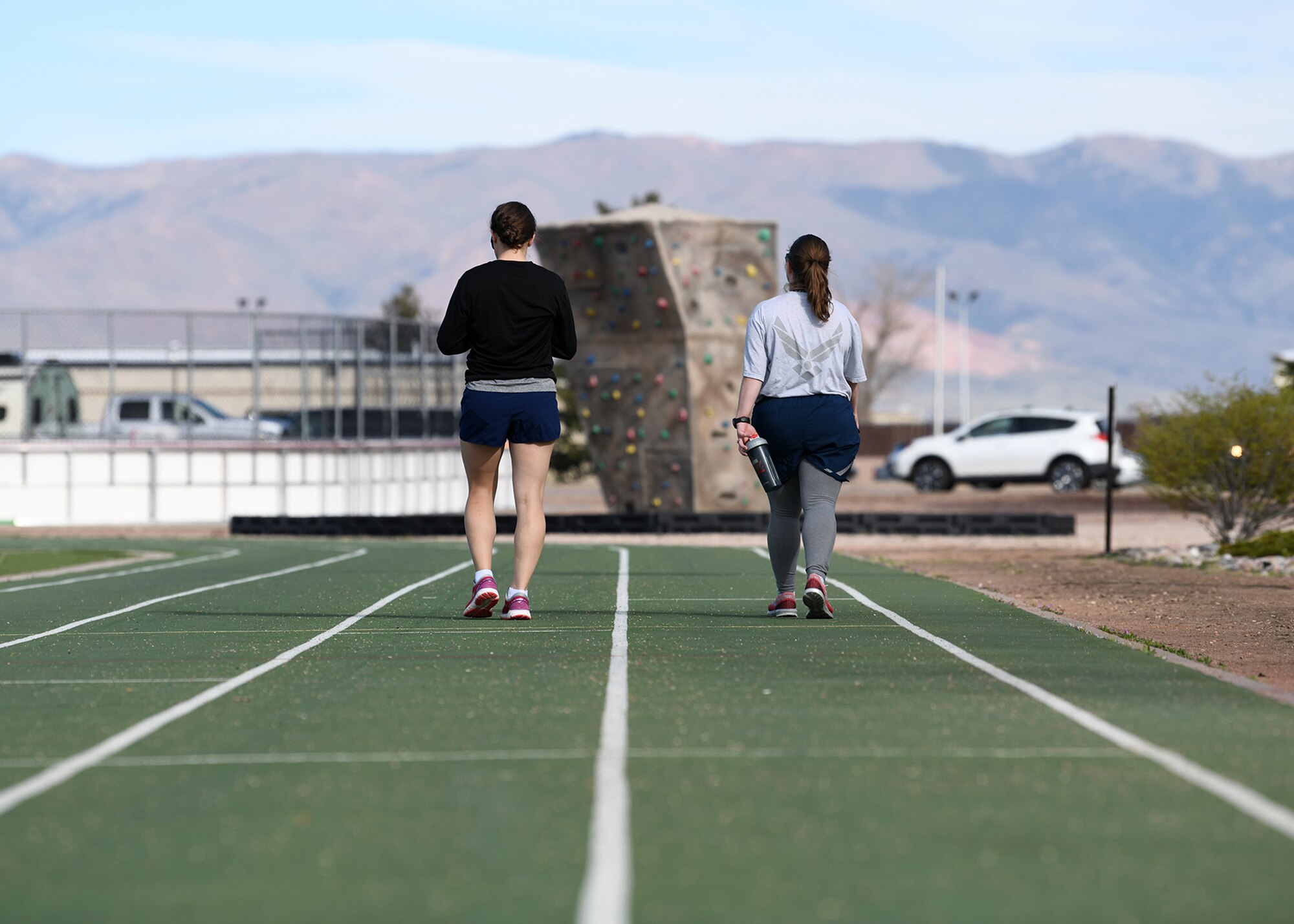 Airmen participate in the annual Walk-a-Lap event in support of sexual assault awareness month