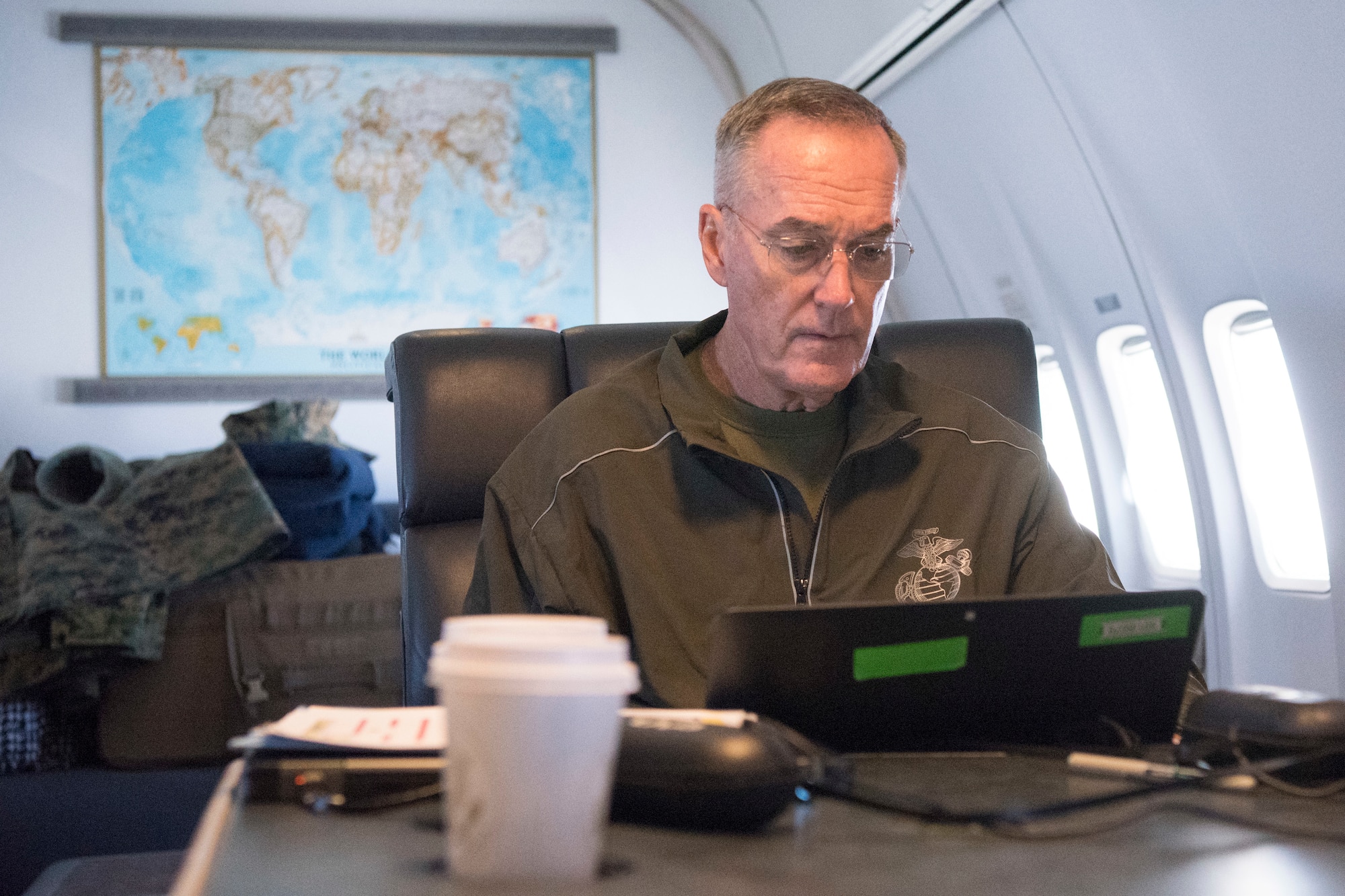 Marine Corps Gen. Joseph F. Dunford Jr., chairman of the Joint Chiefs of Staff, works in his cabin aboard a C-32 aircraft after departing Fort Greeley, Alaska, Aug. 19, 2017. (DOD photo by U.S. Navy Petty Officer 1st Class Dominique A. Pineiro)