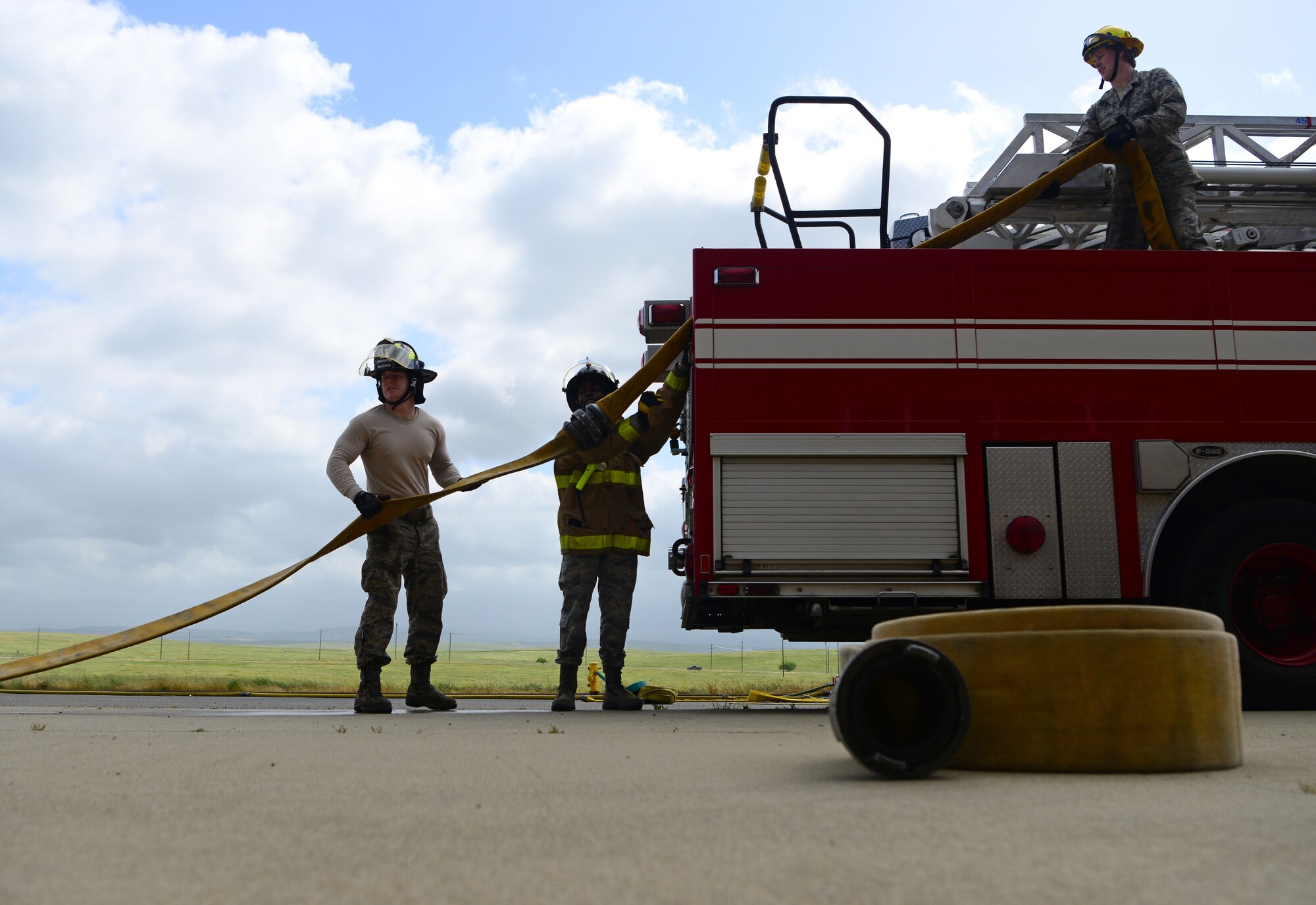 9th CES fire fighters test, certify fire hoses