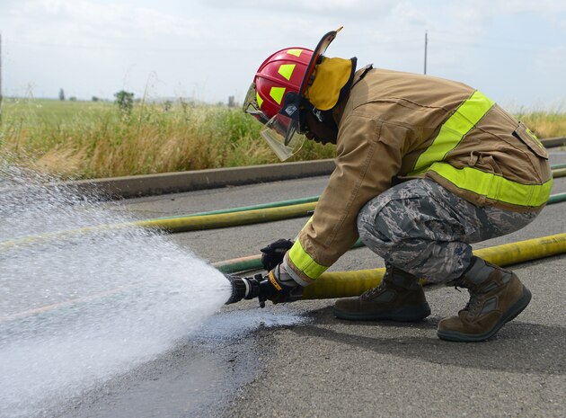 9th CES fire fighters test, certify fire hoses