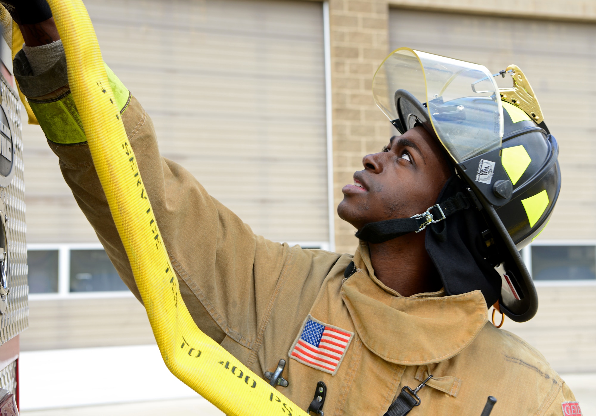 9th CES fire fighters test, certify fire hoses