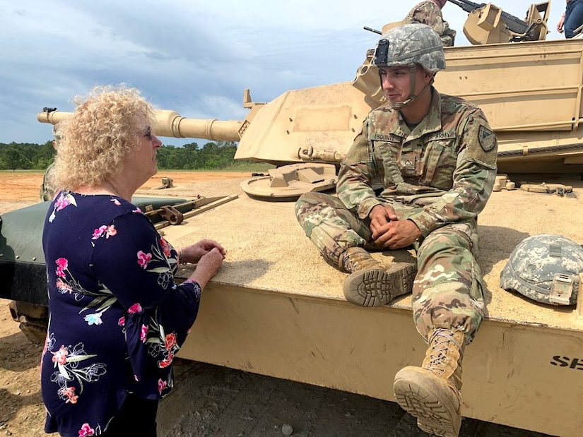 Ms. Kris Thomasian is a school board member on the  Murrieta Valley Unified District Board of Education in Murrieta, CA., She took a few moments to chat with a Soldier during a military vehicle static display.