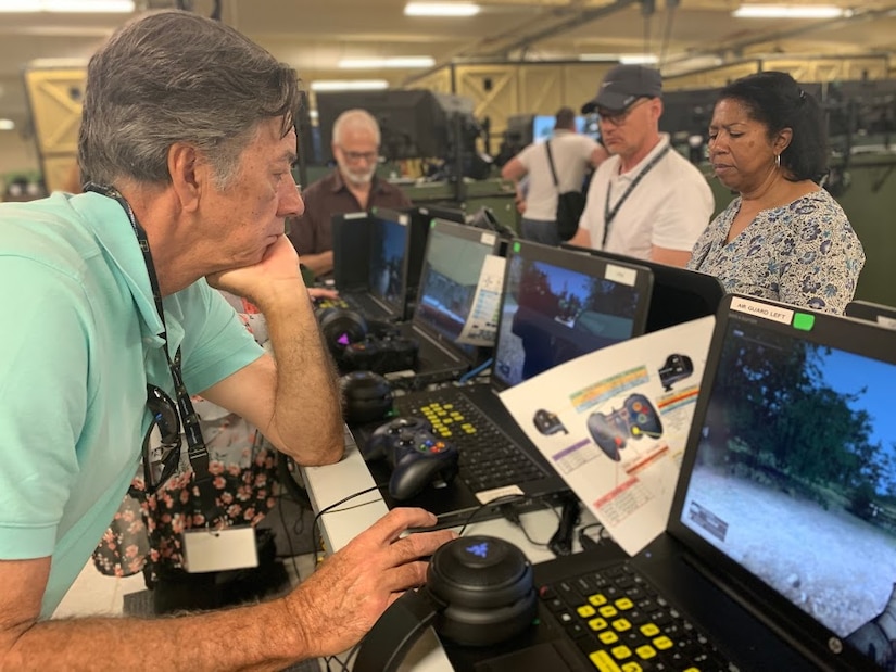 Mr. Bob Tyra, a contract consultant for the Los Angeles County Office of Education checks out the new simulation systems during the Army Educator Tour.