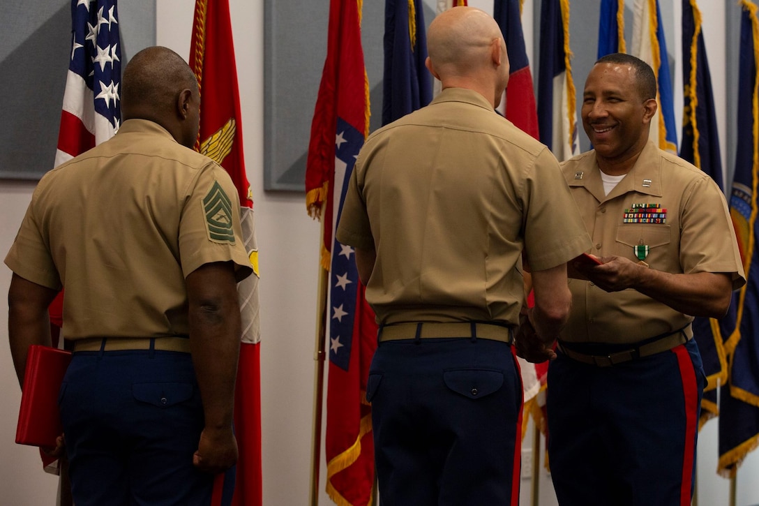 Capt. Ibn. A Taylor receives the Navy and Marine Corps Commendation Medal at his retirement ceremony at Miramar Armory- Florida Army National Guard Center, April 26, 2019.