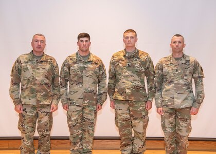 Brig. Gen. Russell Crane, Assistant Adjutant General - Army; Sgt. Avery Liller, West Virginia Army National Guard (WVARNG) NCO of the Year; Spc. Kendall Harris, WVARNG Soldier of the Year; and Command Sgt. Maj. Dusty Jones, WVARNG state command sergeant major, pose for a photo at the conclusion of the 2019 Best Warrior Competition held April 26-28, 2019, at Camp Dawson in Kingwood, W.Va. More than 22 Soldiers and Airmen from West Virginia and the District of Columbia participated in the three-day event designed to measure a Soldier or Airman’s physical abilities, leadership skills, teamwork and critical thinking while completing basic and advanced core warrior competencies. (U.S. Army National Guard Photo by Bo Wriston)