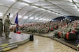 U.S. Army Soldiers fill the USO theater at Camp Buehring, Kuwait, in preparation for a transfer of authority ceremony Apr. 29, 2019. The 1st. Battalion, 108th Aviation Regiment, Kansas Army National Guard, provided aviation support to the 35th Combat Aviation Brigade, Missouri Army National Guard and its subordinate units during their 2018-2019 deployment to the Middle East, supporting Operations Inherent Resolve and Spartan Shield.