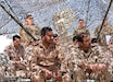 Kuwait Land Forces (KLF) Lt. Col. Ahmad Alsanea, middle, and other KLF soldiers observe a sand table rehearsal for a situational training exercise conducted by U.S. Soldiers from 3rd Battalion, 29th Artillery Regiment, 3rd Armored Brigade Combat Team, 4th Infantry Division, at a Camp Buehring, Kuwait training area on April 23, 2019. Alsanea and his Soldiers trained with their U.S. counterparts as part of an enduring partnership that enables interoperability between regional allies.