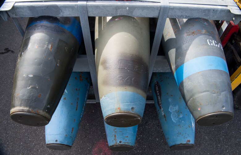 Inert MK82 500-pound bomb bodies await storage during the Spring Ammunition Barge arrival at Joint Base Elmendorf-Richardson, Alaska, April 24, 2019. The ammo barge contained six containers and over 50,000 pounds of munitions.