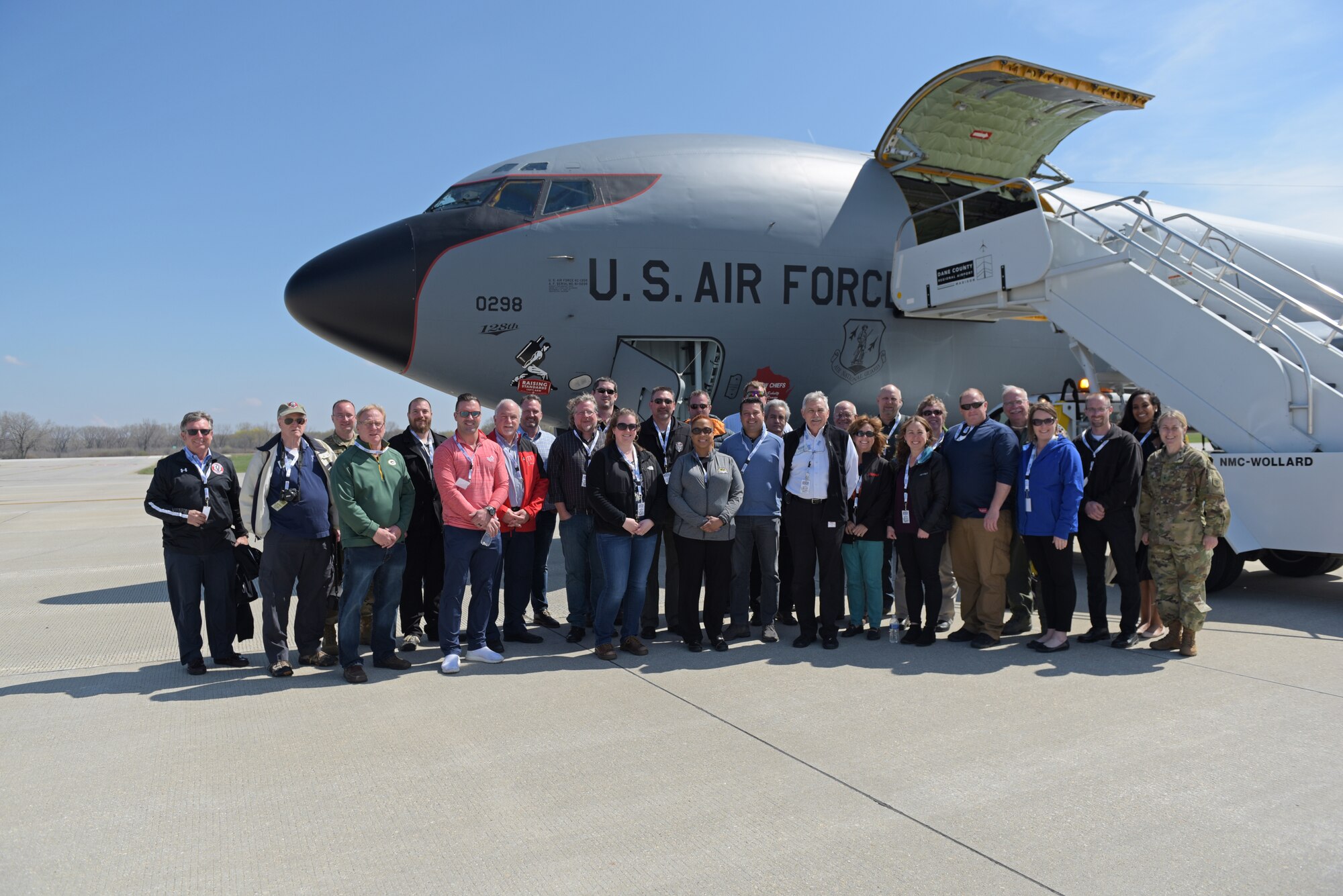 Employers submitted to attend a Madison Boss Lift pose for a group photo in front of a 128th Air Refueling Wing Boeing KC-135 Stratotanker. A group of approximately 20 employers attended the Madison Boss Lift, hosted by Wisconsin Employer Support of the Guard and Reserve Wednesday April, 24 2019 at Truax Field, Madison Wisconsin. (U.S. Air National Guard photo by Tech. Sgt. Mary Greenwood)
