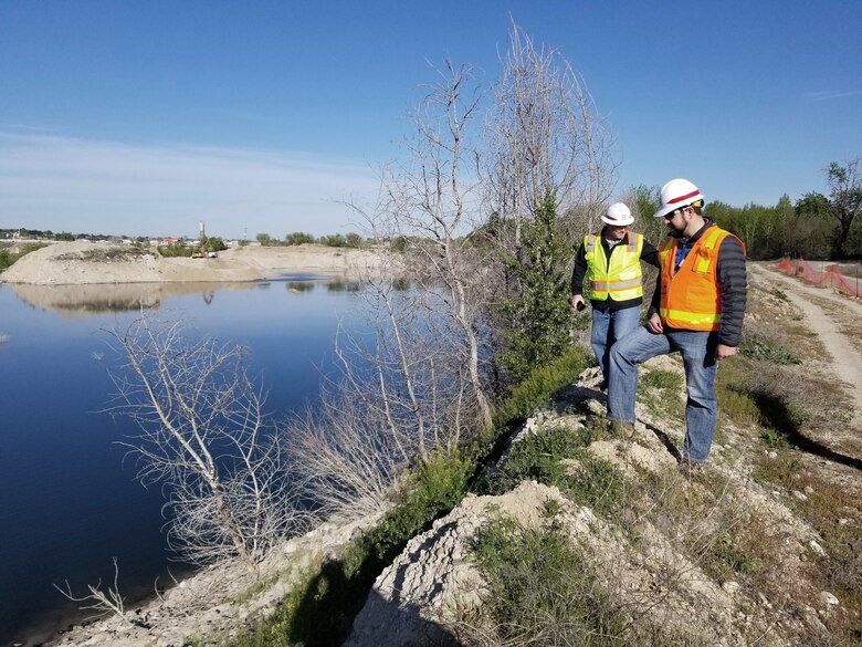 U.S. Army Corps of Engineers, Walla Walla District, Flood-Fight Specialists Michael Schaffer (left), a geotechnical engineer from the District Headquarters in Walla Walla, Washington, and Brandon Hobbs, a hydraulic engineer from the District’s Boise Field Office, monitor Boise River shoreline conditions May 2, 2019, at the Sunroc gravel pit near Eagle Island to support Ada County’s flood-season emergency response planning efforts.