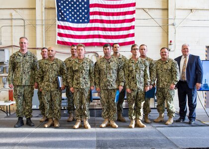 Commander, Naval Sea Systems Command Warfare Centers Rear Adm. Eric Ver Hage, presented a letter of appreciation to the Naval Surface Warfare Center Panama City Division dive team for removing a Quickstrike-Extended Range off the coast of Farallon de Medinilla Island during Valiant Shield 2018 during an All Hands May 1