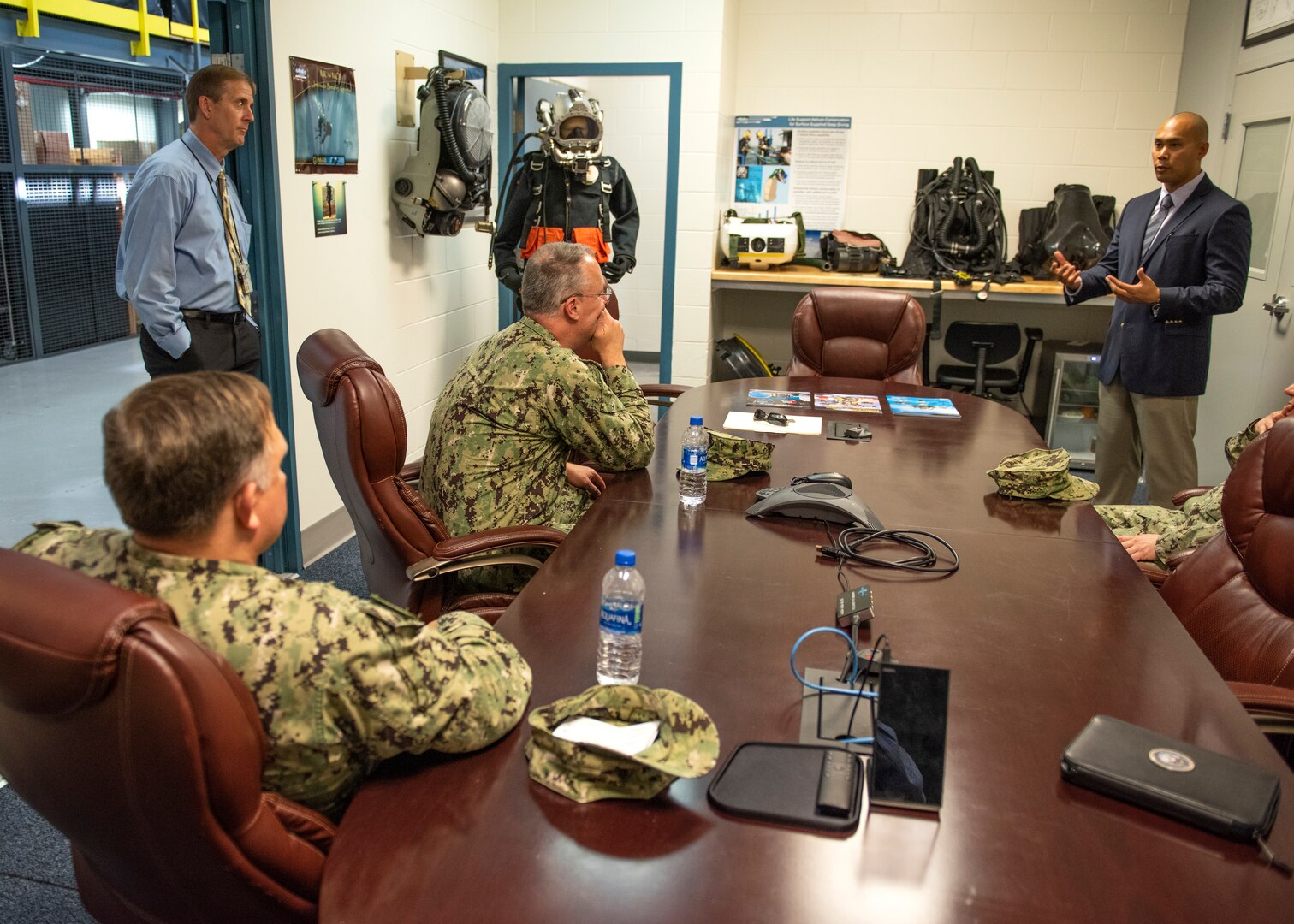 Dominic Gabreleski, diving and protective equipment technical program manager, gives Commander, Naval Sea Systems Command Warfare Centers Rear Adm. Eric Ver Hage, an overview of diving and life support initiatives during a tour of Naval Surface Warfare Center Panama City Division May 1.