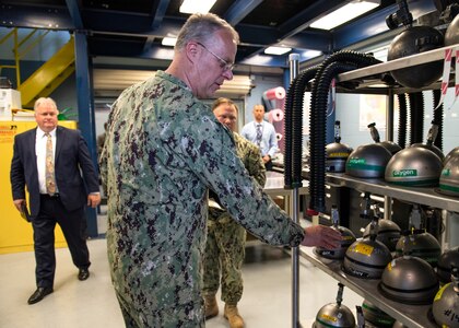 Commander, Naval Sea Systems Command Warfare Centers Rear Adm. Eric Ver Hage tours the MK-16 mod laboratory at Naval Surface Warfare Center Panama City Division May 1. U.S. Navy photo by Eddie Green