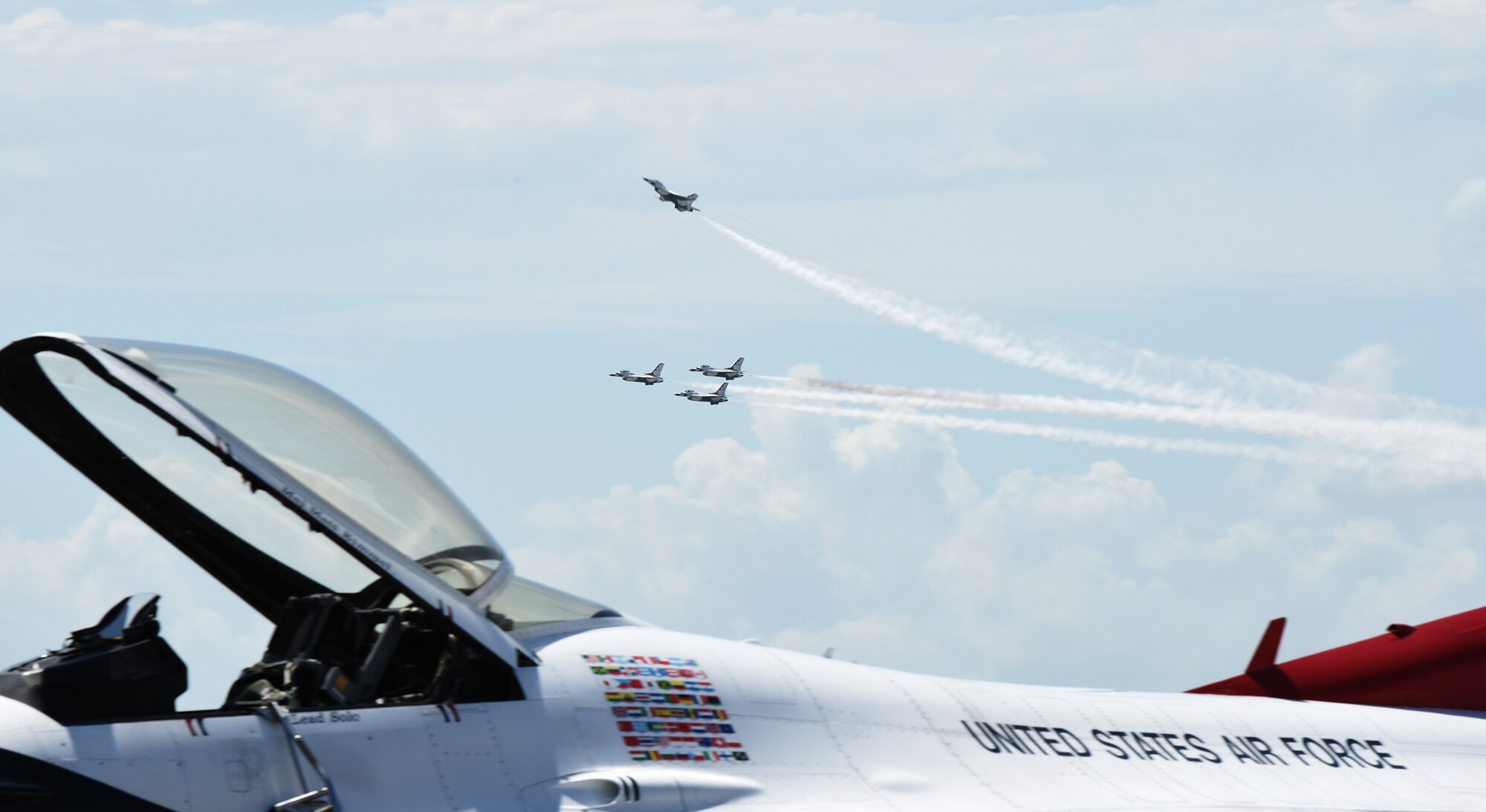 The Air Force Thunderbirds perform a flyover before landing at the Combat Readiness Training Center in Gulfport, Mississippi, May 2, 2019.