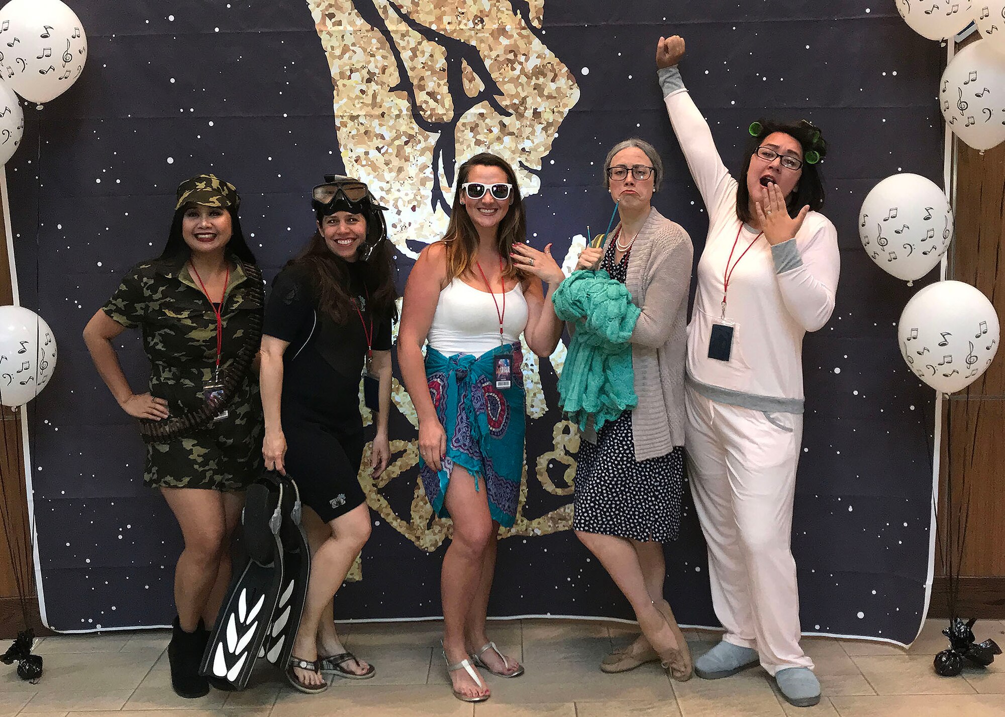 A group of spouses from the 51st Medical Group named “Spouse Spice” pose for a photo while attending the inaugural Osan Spouses’ Dining-in at Osan Air Base, Republic of Korea, April 27. The event, which honored the service and sacrifices made by military spouses, served as an opportunity for both U.S. and Korean spouses to learn about each other. About 85 U.S. Air Force and Army spouses of both enlisted and officers attended the “Rocking the ROK” experience alongside some of their Korean spouse counterparts. Seventh Air Force and 51st Fighter Wing senior leader spouses co-hosted the bilateral event to strengthen the Alliance, while also extending military traditions to those who don't wear the uniform. (Courtesy Photo)