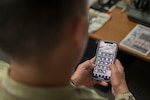 An Air National Guard Airman from the 152nd Airlift Wing installs the AF Connect smartphone application onto his personal phone and selects the 152nd Airlift Wing as one of his favorites. This mobile application will enable him to have a plethora of military resources at his fingertips.