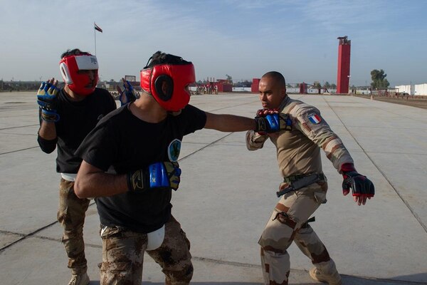 Task Force Narvik personnel conduct a High Intensity Close Combat Training course at the Iraq Counter-Terrorist Defense Academy. The objective of the course is to train Iraqi cadres in close combat so they can in turn train their soldiers.