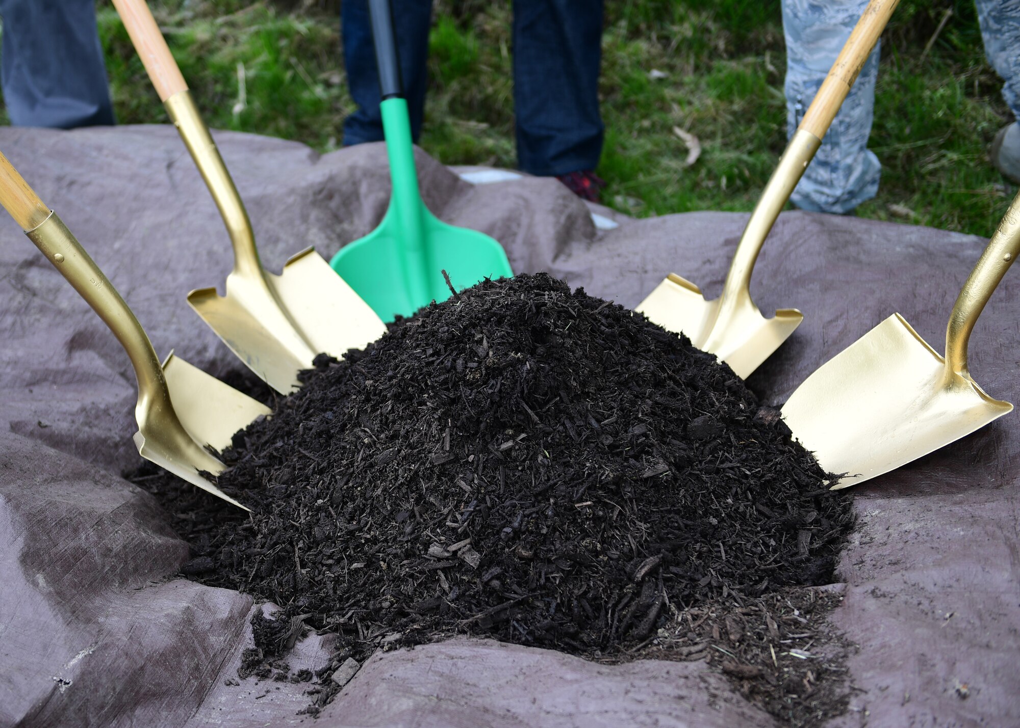 Personnel assigned to the 911th Airlift Wing, prepare to plant a tree at the Pittsburgh International Airport Air Reserve Station, Pennsylvania, May 2, 2019. Every year the 911th AW celebrates Earth Day with a tree planting ceremony to symbolize the Air Force Reserve’s commitment to environmental sustainability.  (U.S. Air Force Photo by Senior Airman Grace Thomson)