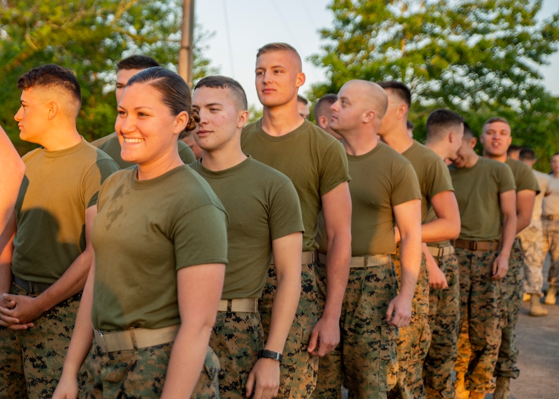 Marines and Airmen prepare for a motivational run at Crystal Springs, Miss., on April 26, 2019. The Marines and Airmen are part of the Department of Defense’s Innovative Readiness Training Camp Kamassa near Crystal Springs. The program supports the community by pairing military members with civil projects that benefit the community, and enables Marine Reserve units to increase their efficiency and performance. (U.S. Marine Corps photo by Lance Cpl. Jose Gonzalez)