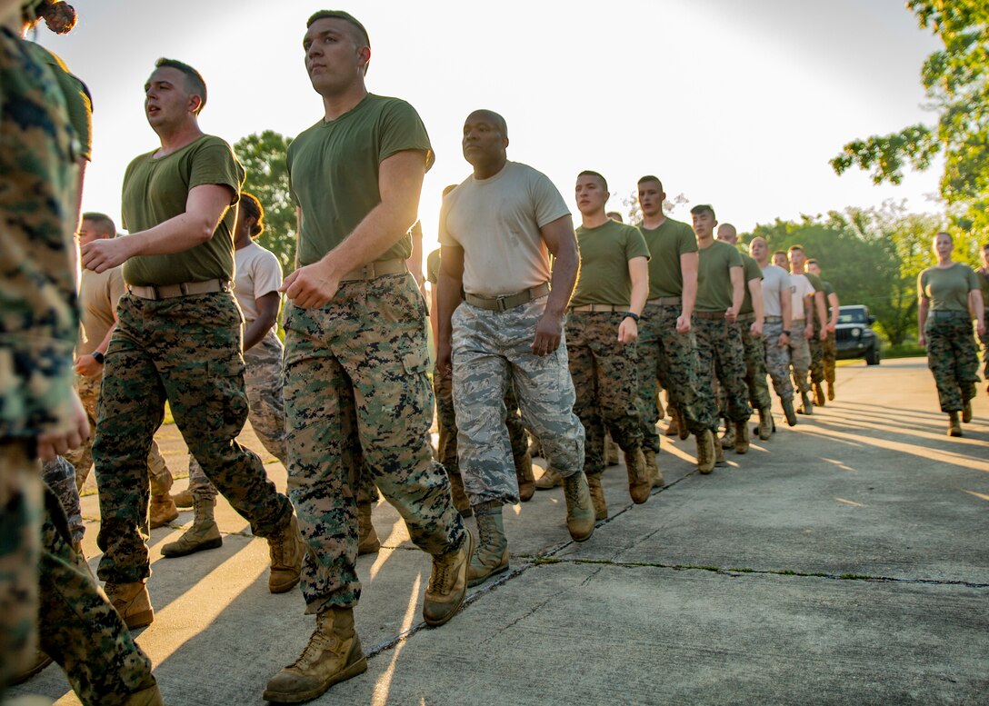 Marines and Airmen complete a motivational run at Crystal Springs, Miss., on April 26, 2019. The Marines and Airmen are part of the Department of Defense’s Innovative Readiness Training Camp Kamassa near Crystal Springs. The program supports the community by pairing military members with civil projects that benefit the community, and enables Marine Reserve units to increase their efficiency and performance. (U.S. Marine Corps photo by Lance Cpl. Jose Gonzalez)