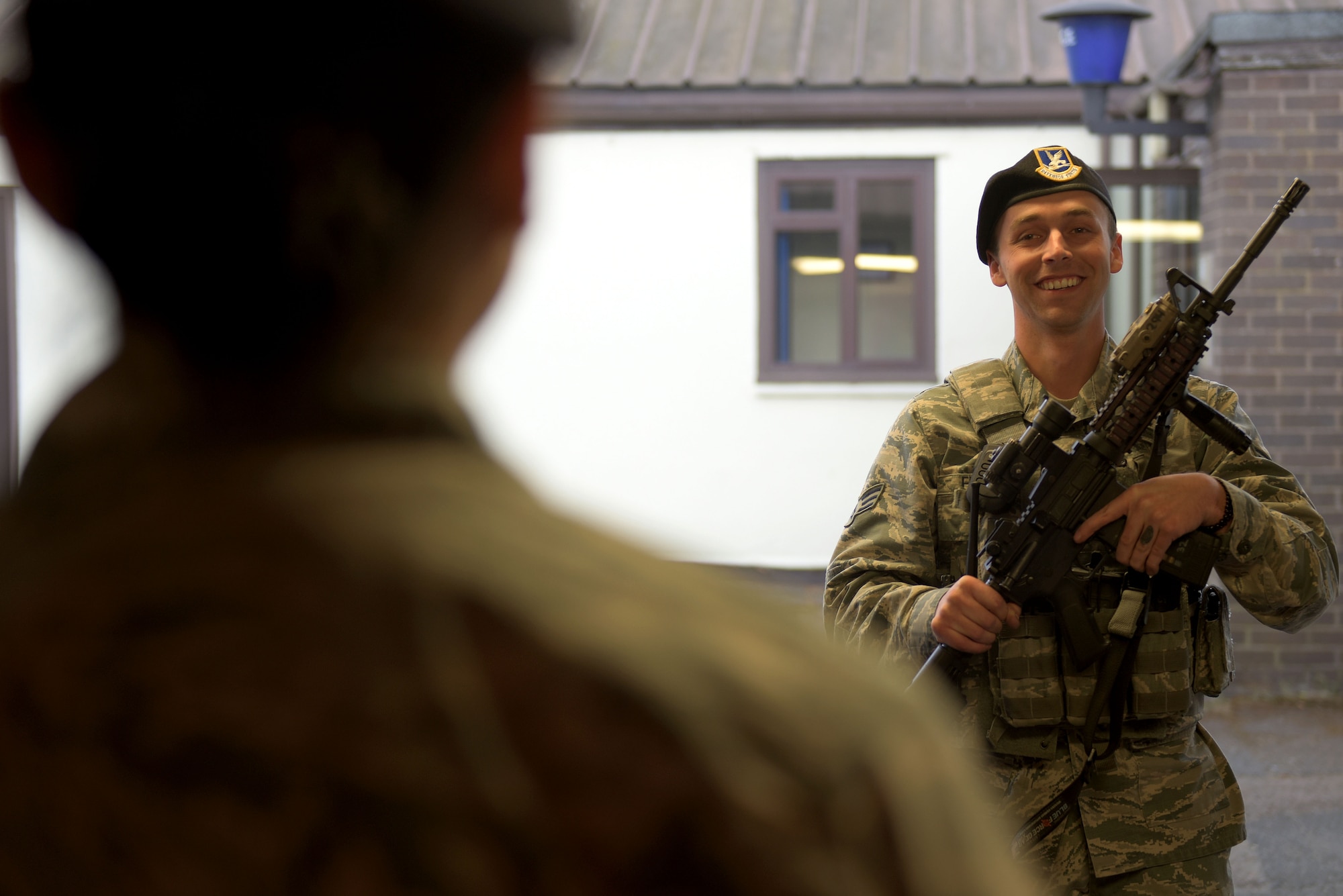 U.S. Air Force Senior Airman Christopher Francis, 100th Security Forces Squadron armorer, prepares to de-arm at RAF Mildenhall, England, May 2, 2019. This procedure requires two Airmen to be present when clearing a weapon before turning it into the armory. (U.S. Air Force photo by Senior Airman Benjamin Cooper)