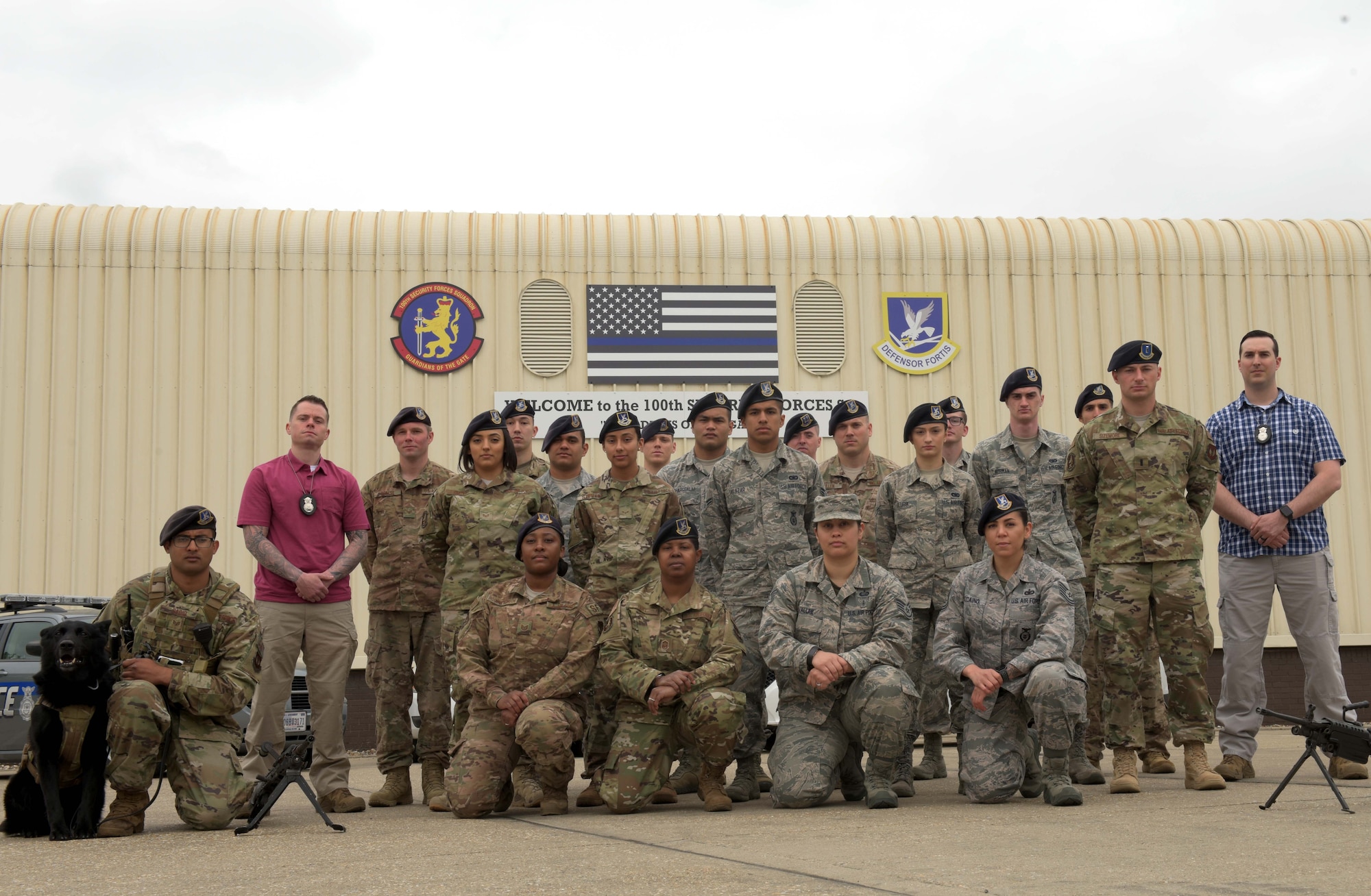 Members of the 100th Security Forces Squadron pose for a photo at RAF Mildenhall, England, May 2, 2019. Security Forces is a diverse career field that encompasses several different duties such as: military working dog handlers, investigations and patrol. (U.S. Air Force photo by Senior Airman Benjamin Cooper)