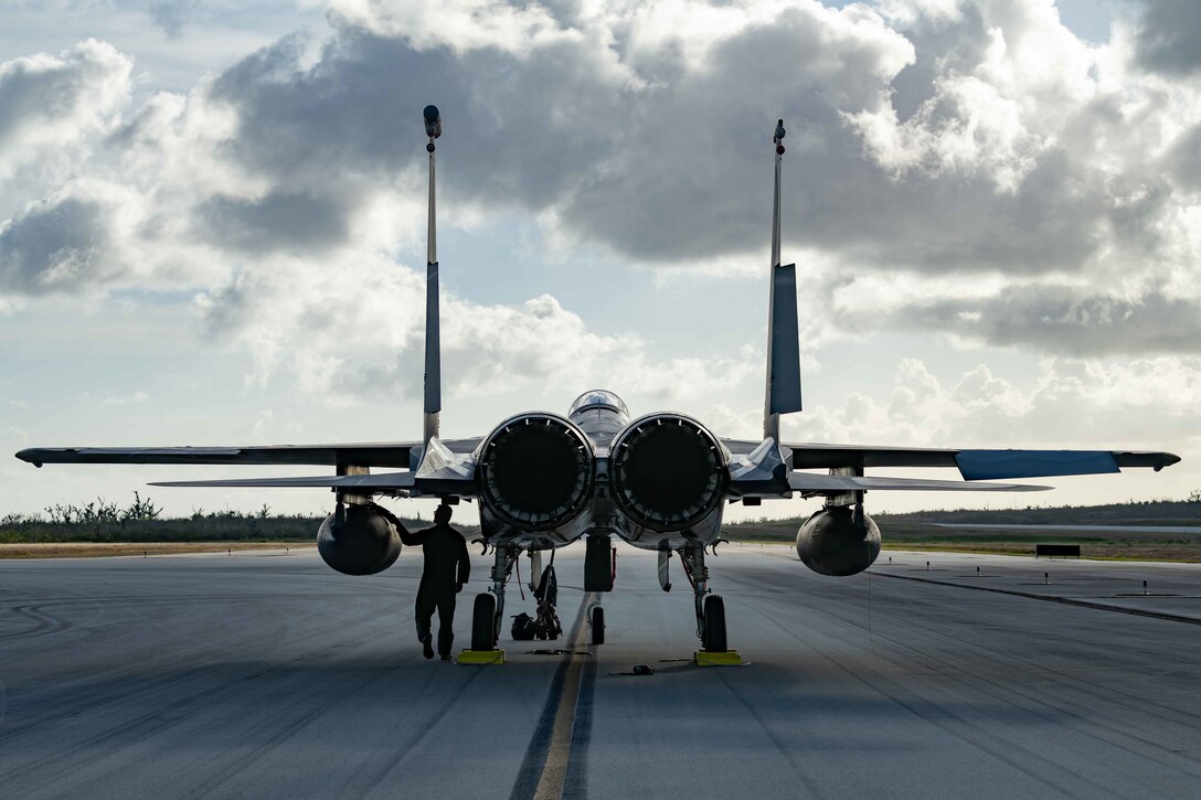 A pilot inspects his F-15C Eagle