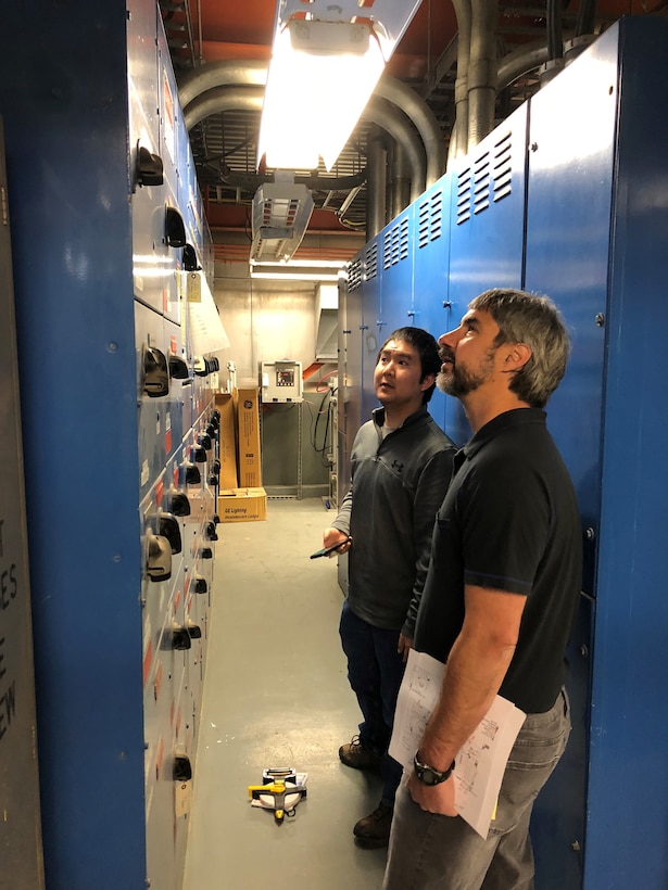 U.S. Army Corps of Engineers, Alaska District Electrical Engineer Zachary Sam and Chief of Mechanical Engineering Brent Goering check out switch boxes Wednesday April 24, 2019 at the facility where the final decommissioning of the SM-1A deactivated nuclear power plant will take place. Part of the effort will involve segregating components of the co-located, still operational steam plant from where the decommissioning will take place. U.S. Army Corps of Engineers, Baltimore District, with its Radiological Center of Expertise, and Alaska District personnel are working together closely in partnership on the SM-1A decommissioning at Fort Greely in Alaska.