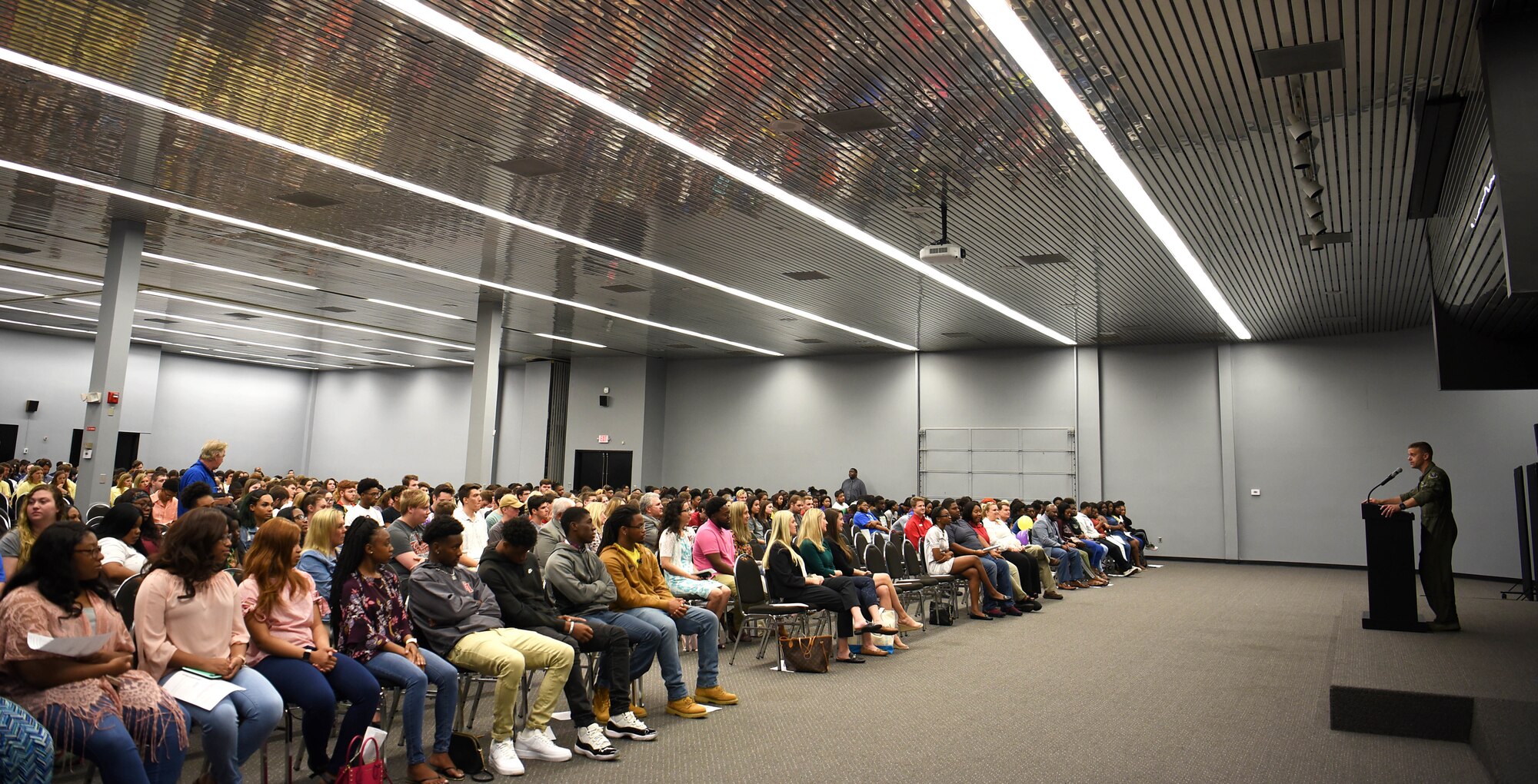 Col. William Denham, 14th Flying Training Wing vice commander, speaks to students during the Lowndes County Senior Breakfast May 1, 2019, at the East Mississippi Community College in Mayhew, Miss. Denham and the speakers before him spoke about different topics and experiences to inspire the young men and women in the crowd. (U.S. Air Force photo by Senior Airman Keith Holcomb)