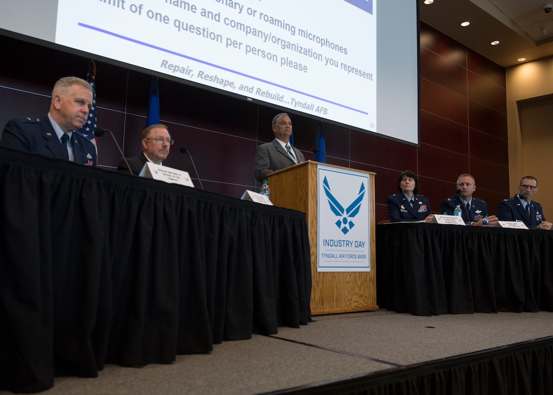 Seated from left to right, Brig. Gen. John Allen Jr., Air Force Director of Civil Engineers, Terry Edwards, Air Force Civil Engineer Center director, Brig. Gen. Patrice Melançon, Tyndall Program Management Office executive director, Col. Brian Laidlaw, 325th Fighter Wing commander, and Col. Brent Hyden, Tyndall PMO director, participate in a discussion panel May 2, 2019, during the second industry day held to provide updates and future plans for rebuilding the base that was destroyed by Hurricane Michael Oct. 10, 2018. (U.S. Air Force photo by Airman 1st Class Monica Roybal)