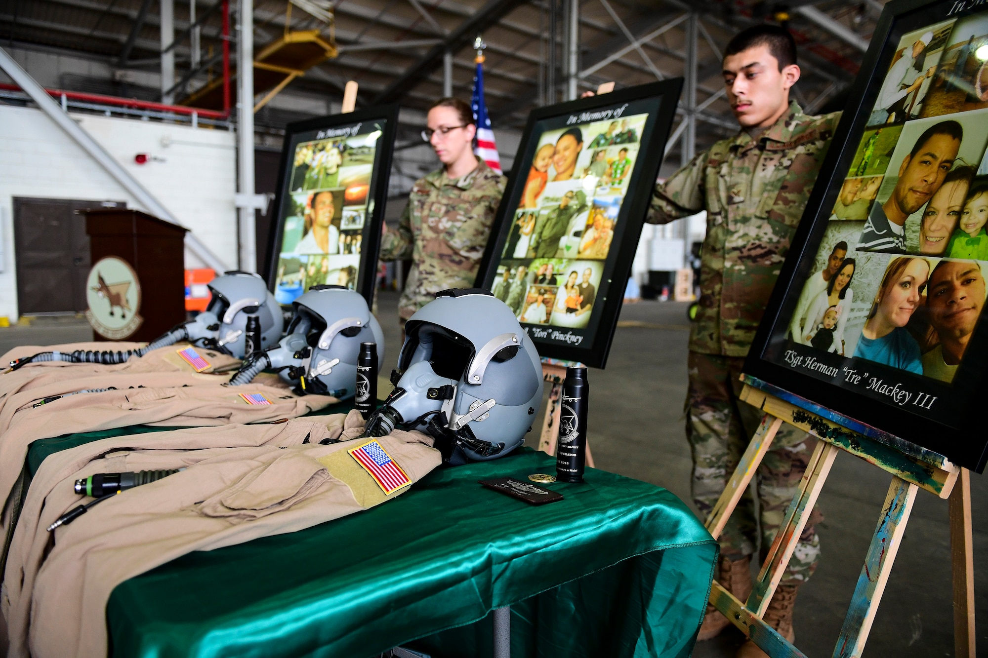 Airmen form the 22d Expeditionary Air Refueling Squadron view a display during the Shell 77 memorial ceremony, May 3, 2019, at Incirlik Air Base, Turkey. The three Airmen remembered were Capt. Mark T. Voss, Capt. Victoria A. Pinckney and Tech Sgt. Herman “Tre” Mackey III., who were deployed to 22d EARS from the 92d Air Refueling Wing at Fairchild Air Force Base, Wash., in support of Operation Enduring Freedom. (U.S. Air Force photo by Staff Sgt. Ceaira Tinsley)