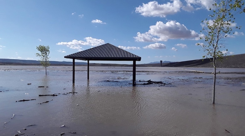 High water levels inundate one of the sun covers at the swim beach area, May 2, 2019.