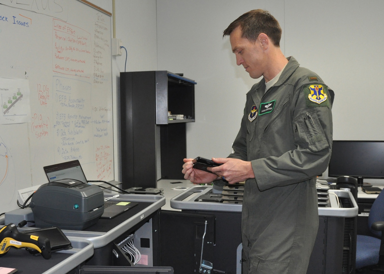 2nd Lt. Lucas Erickson, 12th Training Squadron student pilot and electronic flight bag technician, digitally issues an iPad tablet, used as an EFB by aircrew flying out of Joint Base San Antonio-Randolph, Texas, May 3, 2019. EFBs increase situational awareness in the cockpit and allow aviators to access critical mission data immediately, instead of searching through traditional paper flight publications.