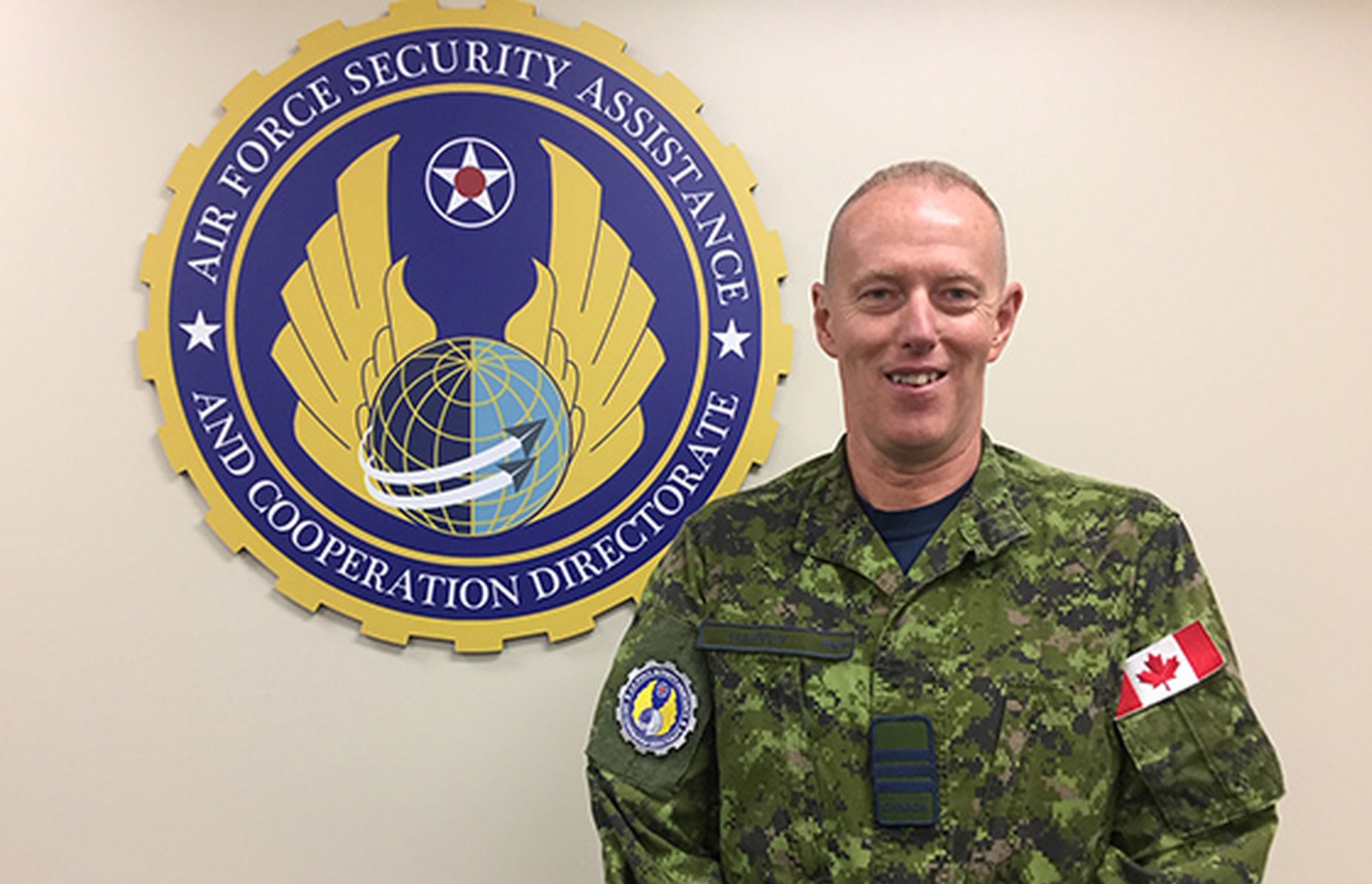 Lt. Col. Jean-Francois Harvey of Canada serves as lead representative of the foreign liaison officers, part of the Air Force Life Cycle Management Center’s Air Force Security Assistance and Cooperation Directorate, headquartered at Wright-Patterson Air Force Base. (Skywrighter photo/Amy Rollins)