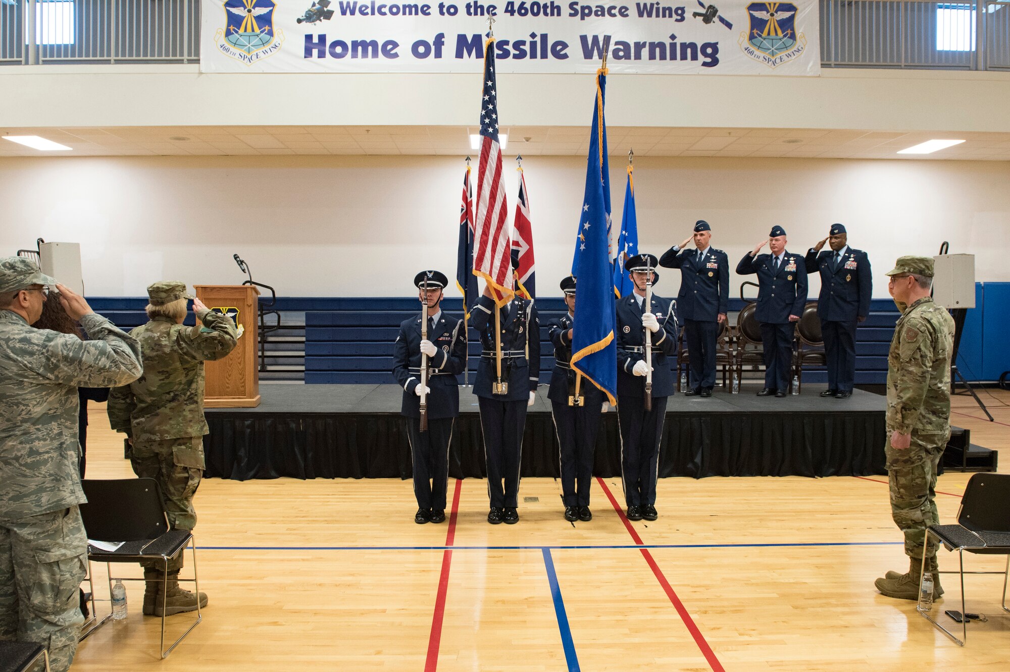 Mile-High Honor Guardsmen present the colors during the playing of the national anthem at the 460th Space Wing change of command ceremony May 3, 2019, on Buckley Air Force Base, Colorado.