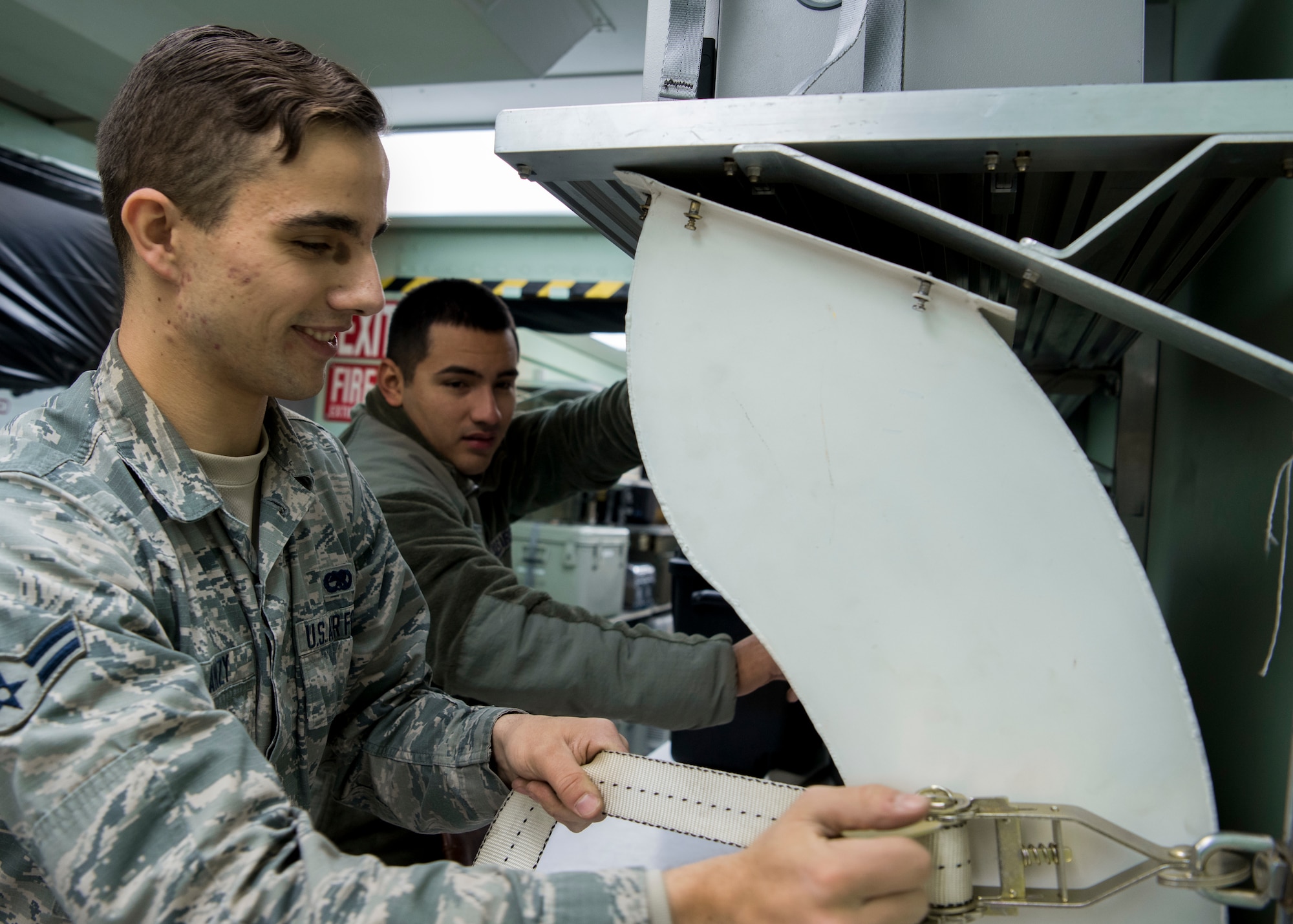 Airman First Class Francis Blanzy, 366th Component Maintenance Squadron precision measure equipment laboratoty technician, and Airman First Class Anthony Zermeno, 366th CMS PMEL technician, straps down diagnostic equipment in a Rapid Assistance Support for Calibration (RASCAL) Jan. 14, 2019, at Mountain Home Air Force Base, Idaho. The PMEL team restored and prepared this RASCAL, which is one of two of its kind in the Air Force, for its first deployment in 10 years to Joint Base Pearl Harbor - Hickam, Hawaii. (U.S. Air Force photo by Airman First Class Andrew Kobialka)