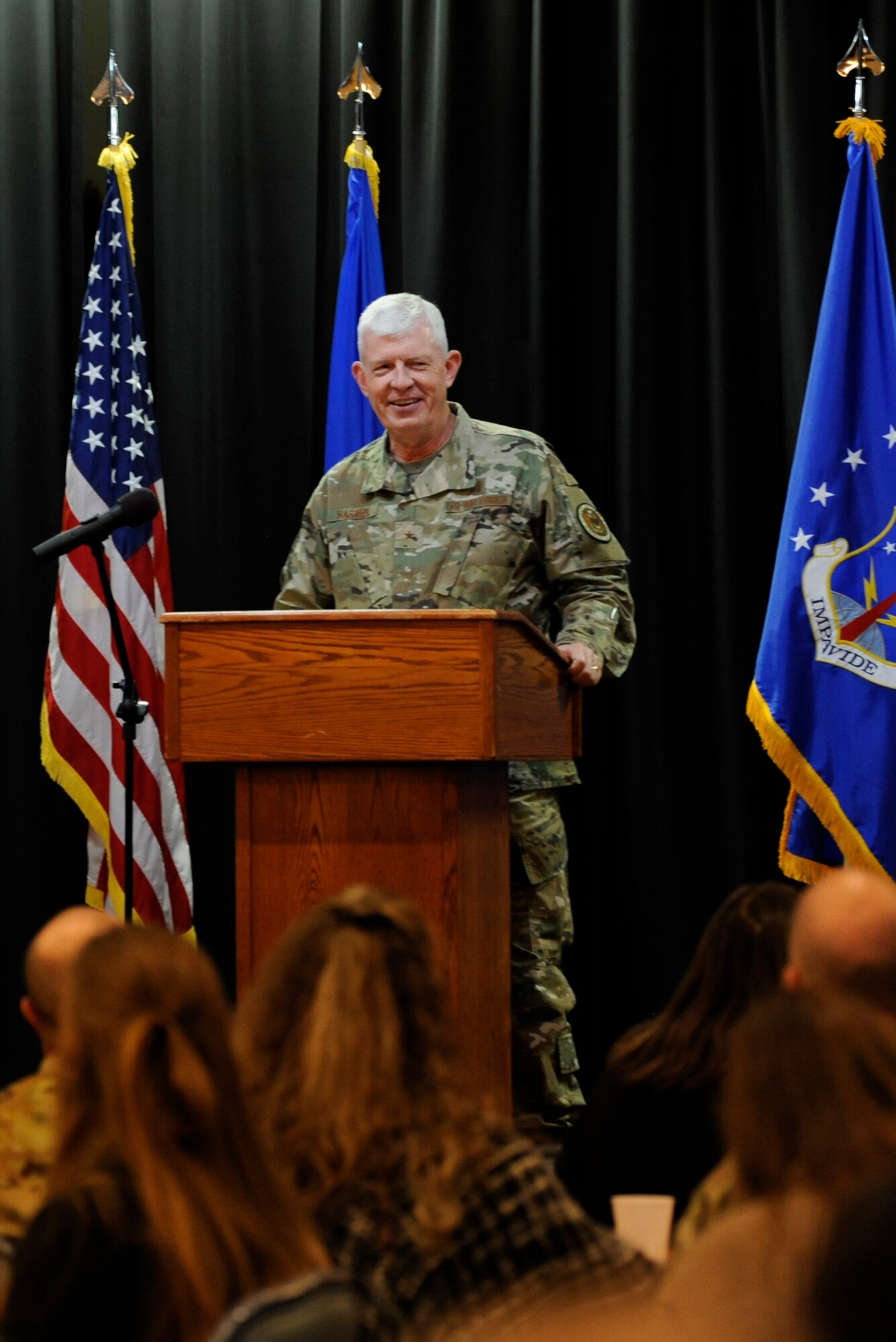 Chaplain (Brig. Gen.) Ron Harvell, Air Force Deputy Chief of Chaplains, speaks during the National Prayer Luncheon May 1, 2019 at F. E. Warren Air Force Base, Wyoming. Harvell stated people who practice their faith with others are six times less likely to commit suicide. (U.S. Air Force photo by Tech. Sgt. Ashley Manz)