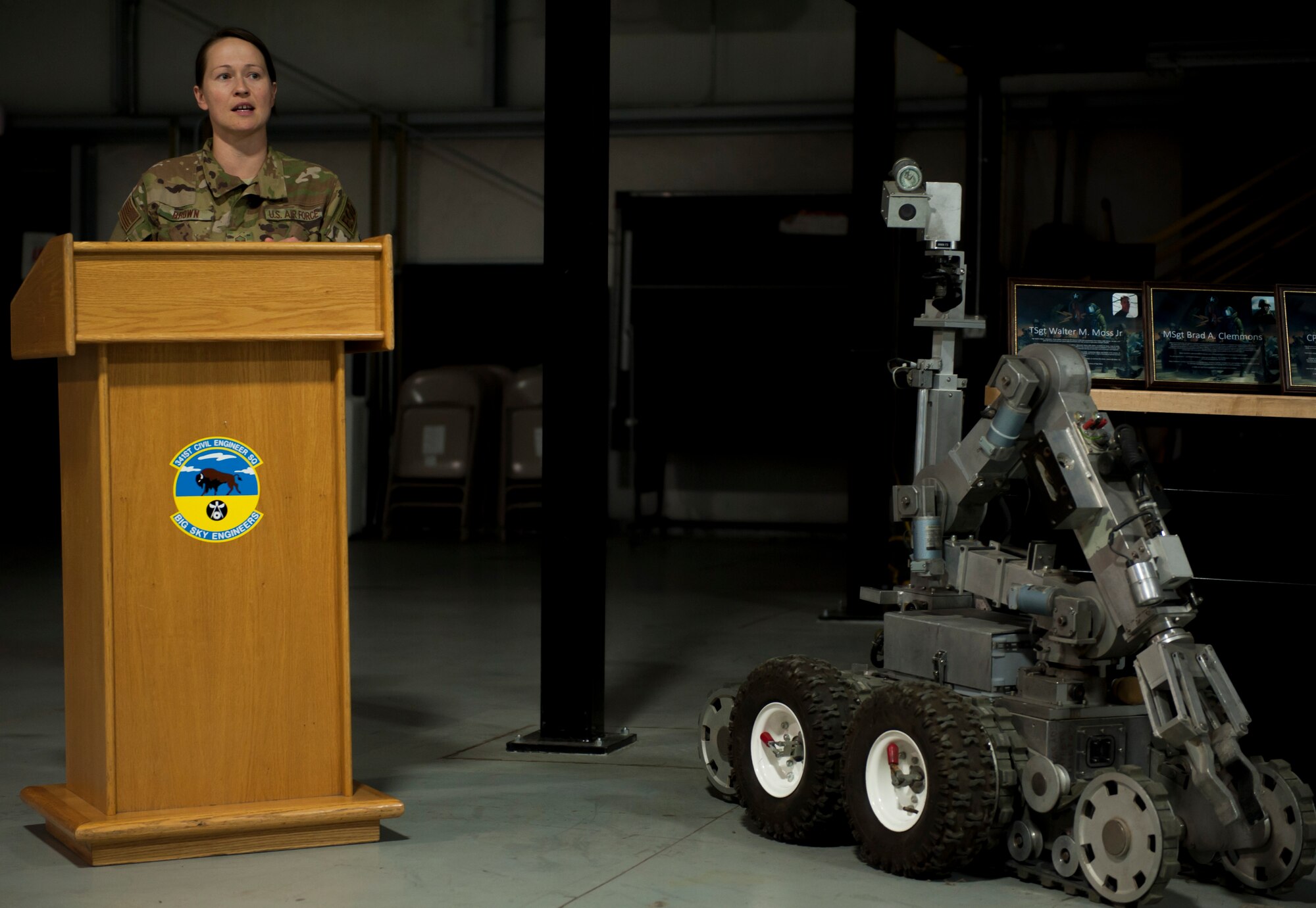 Master Sgt. Bambi Brown, 341st Force Engineer Squadron explosive ordnance disposal flight chief, makes opening remarks during a memorial ceremony, May 3, 2019, at Malmstrom Air Force Base, Mont. to honor Air Force EOD technicians who sacrificed their lives in the line of duty.