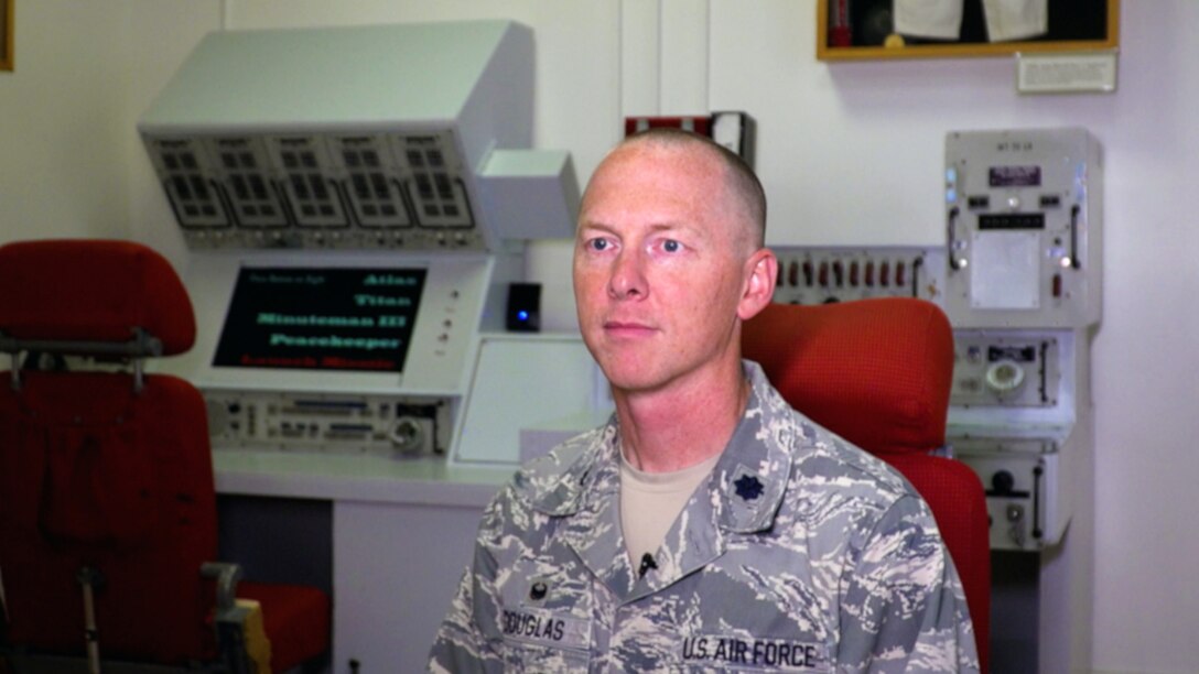Lt. Col. Joel Douglas, 321st Missile Squadron commander, interviews at the F.E. Warren base museum, Wyoming, April 26, 2019. He shares his thoughts on the impact 1st Lt. Tenaugrie "Ten" Malone, 321 MS assistant flight commander, has on his squadron. (U.S. Air Force photo by 1st Lt. Nikita Thorpe)