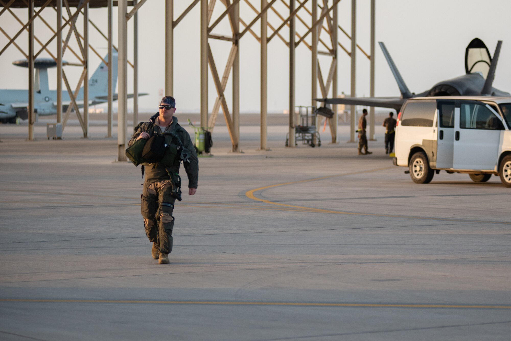 A 4th Expeditionary Fighter Squadron pilot steps to an F-35A Lightning II April 26, 2019, at Al Dhafra Air Base, United Arab Emirates.