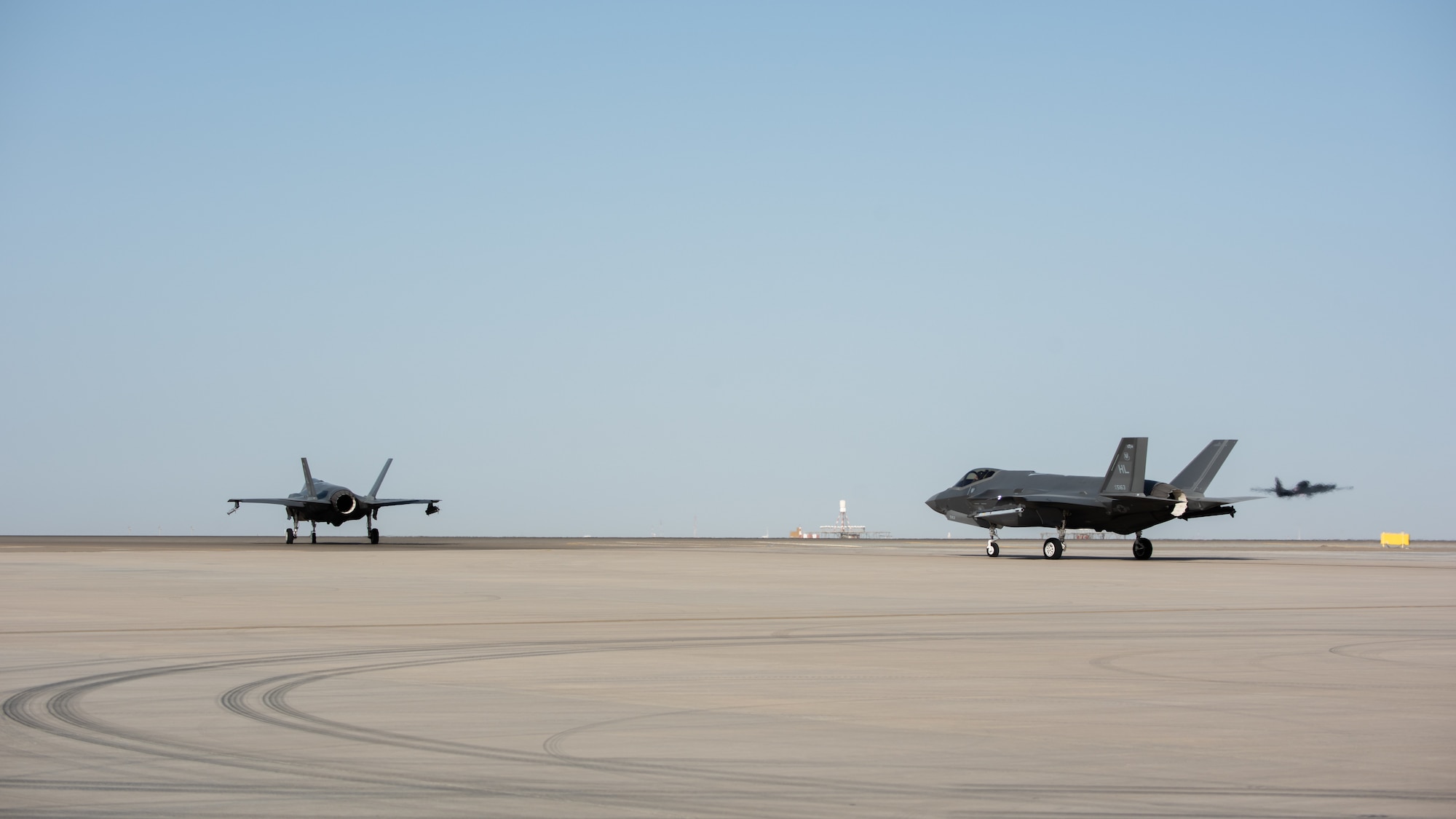 Two F-35A Lightning IIs taxi before takeoff April 26, 2019, at Al Dhafra Air Base, United Arab Emirates.