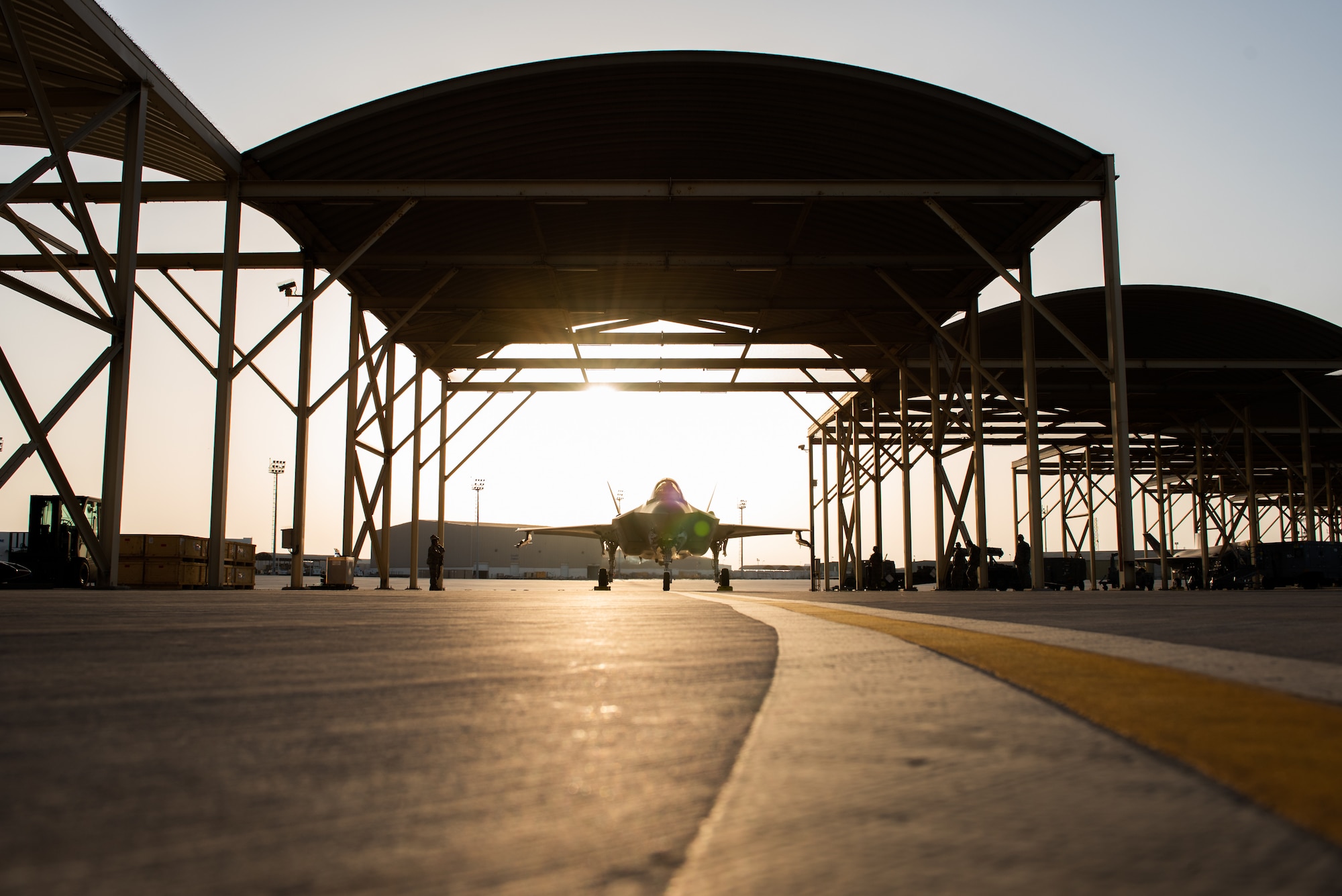 An F-35A Lightning II sits under a sunshade before the first combat mission April 26, 2019, at Al Dhafra Air Base, United Arab Emirates.