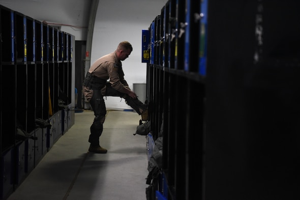 An F-35A Lightning II pilot assigned to the 4th Expeditionary Fighter Squadron dons an anti-gravity suit in preparation for the first combat sortie in the U.S. Air Forces Central Command area of responsibility April 26, 2019, Al Dhafra Air Base, United Arab Emirates.