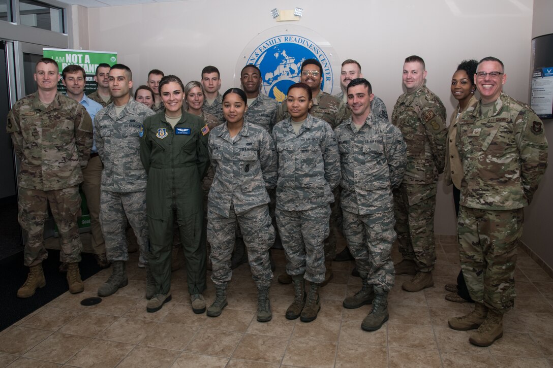 932nd Airlift Wing Master Sgt. Christopher Parr, public affairs photojournalist, far right, poses with the newest Citizen Airmen to join team Scott, May 4, 2019, Scott Air Force Base, Illinois. Each month leadership welcomes newcomers along with Wing agencies they provide briefings detailing the mission, Citizen Airmen responsibility, and answer questions each month.(U.S. Air Force photo by Senior Airman Brooke Deiters)