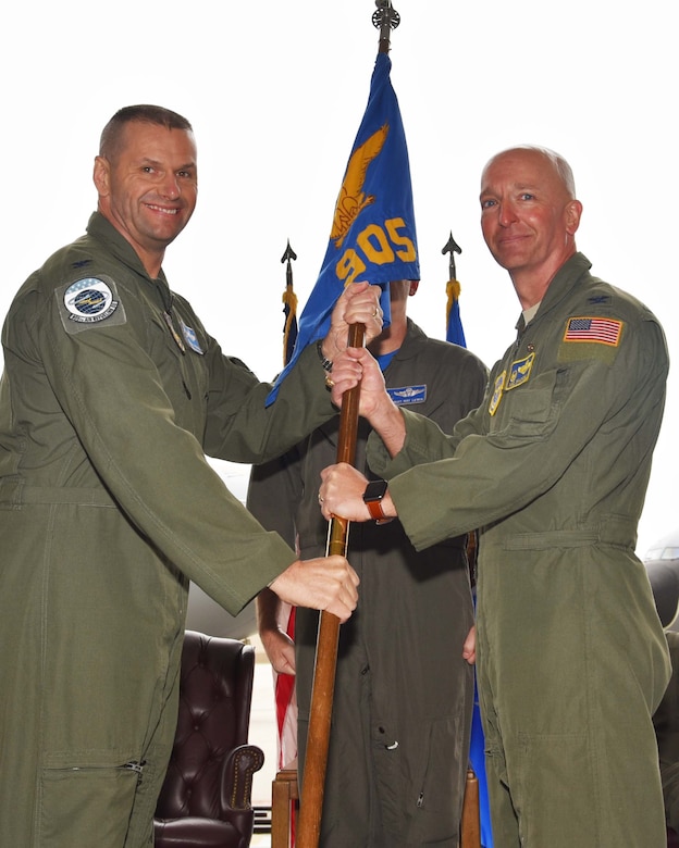 Col. Phil Heseltine, 931st Air Refueling Wing commander, receives the guidon from retired Col. Noel Bradford, the previous commander of the 905th Air Refueling Squadron, during an official ceremony, May 4, 2019, McConnell Air Force Base, Kan. The 905 ARS was the first Air Force flying unit to be assigned to Grand Forks, and it received its first KC-135 Stratotanker in 1960.  The unit stayed at Grand Forks Air Force Base, N.D., until it was deactivated in 2010.