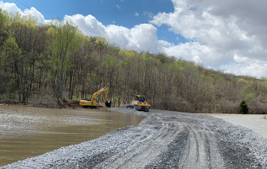 Crews complete the access road to a bluff along levee R562 just outside of Peru, Neb.