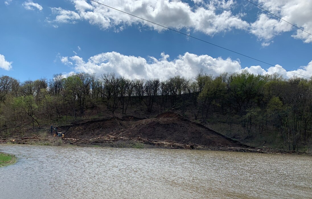 Burrow area along levee R562 outside of Peru, Neb., is cleared and grubbed.