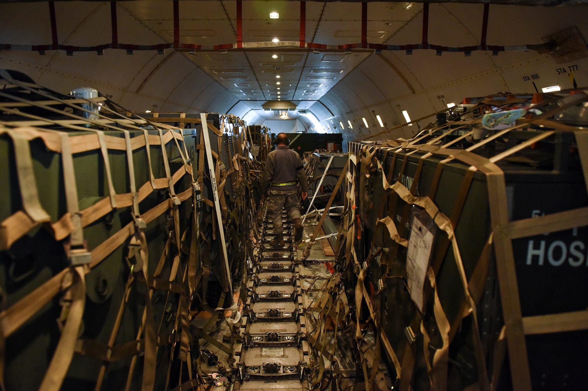 Tech. Sgt. Russell Dzemyan, 728th Air Mobility Squadron aircraft services supervisor, walks through an Atlas 747 airliner March 3, 2019, at Incirlik Air Base, Turkey. The 728th AMS Aircraft Services Flight consists of four sections: ramp services, special handling, clean and dirty fleet and cargo processing. (U.S. Air Force photo by Staff Sgt. Ceaira Tinsley)