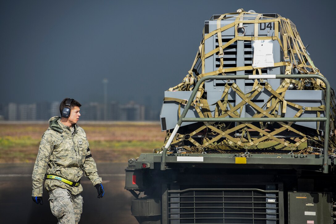 Senior Airman Dane Johnson, 728th Air Mobility Squadron aircraft services journeyman, unloads cargo from a K-loader March 3, 2019, at Incirlik Air Base, Turkey. The 728th AMS ensures the base has necessary supplies and is postured to support Operation Inherent Resolve. (U.S. Air Force photo by Staff Sgt. Ceaira Tinsley)